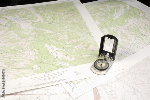 several topo Maps and compass photo