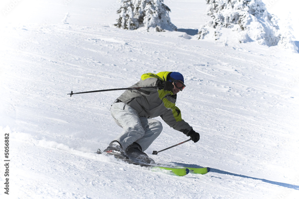 Winter ski sports. Skier downhill