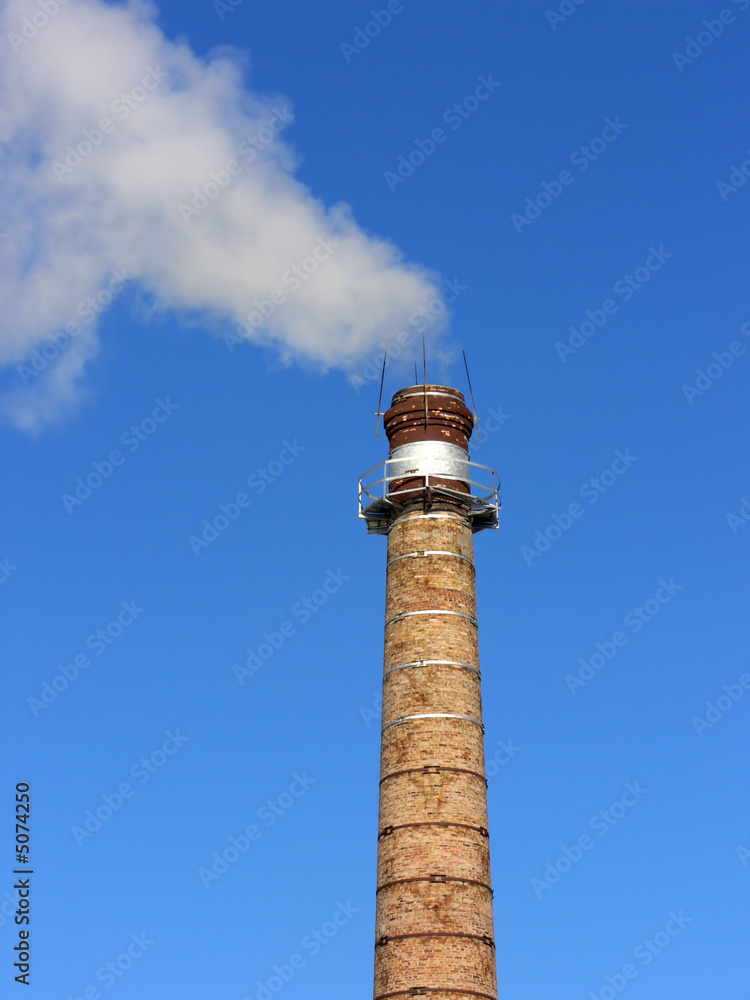 Factory pipe contaminating an atmosphere