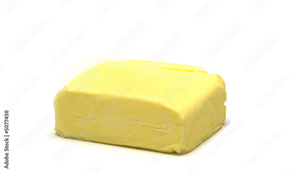 lump butter on white background 