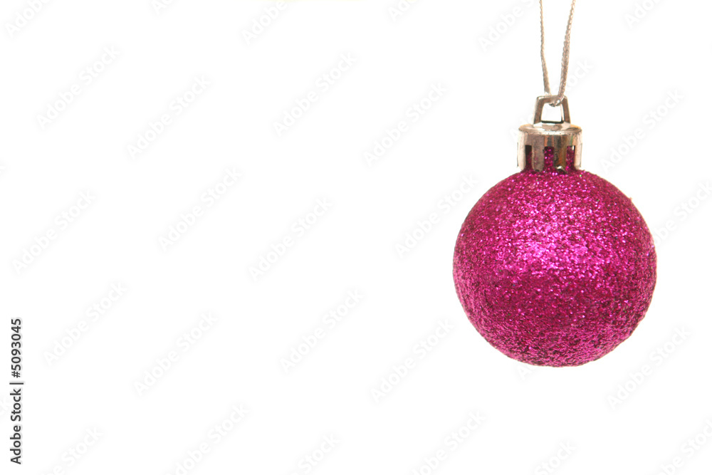 One red brilliant toy on a white background One red brilliant toy on a white background