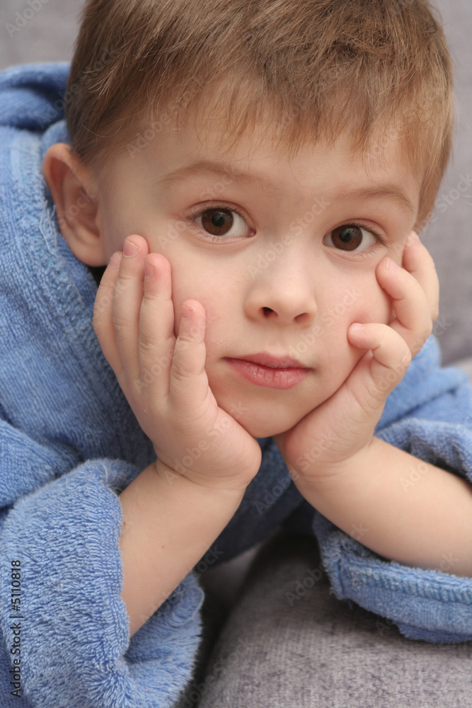 The sight of the boy which lays on a sofa The sight of the boy which lays on a sofa