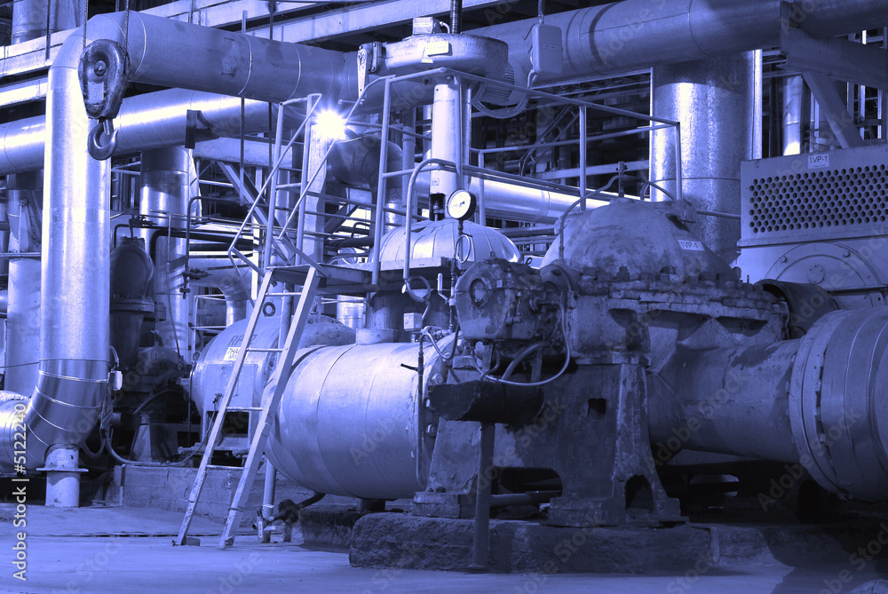 Equipment, cables and piping as found inside of a modern industr Equipment, cables and piping as found inside of a modern industr