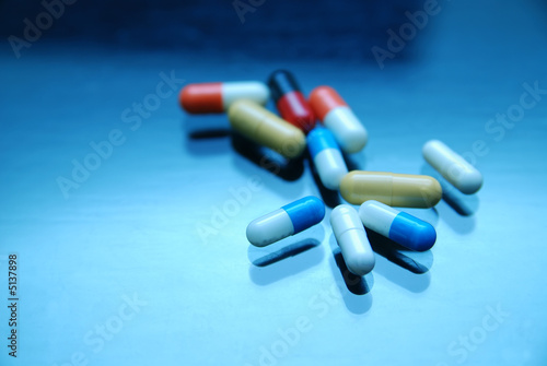 pills on glosy surface 