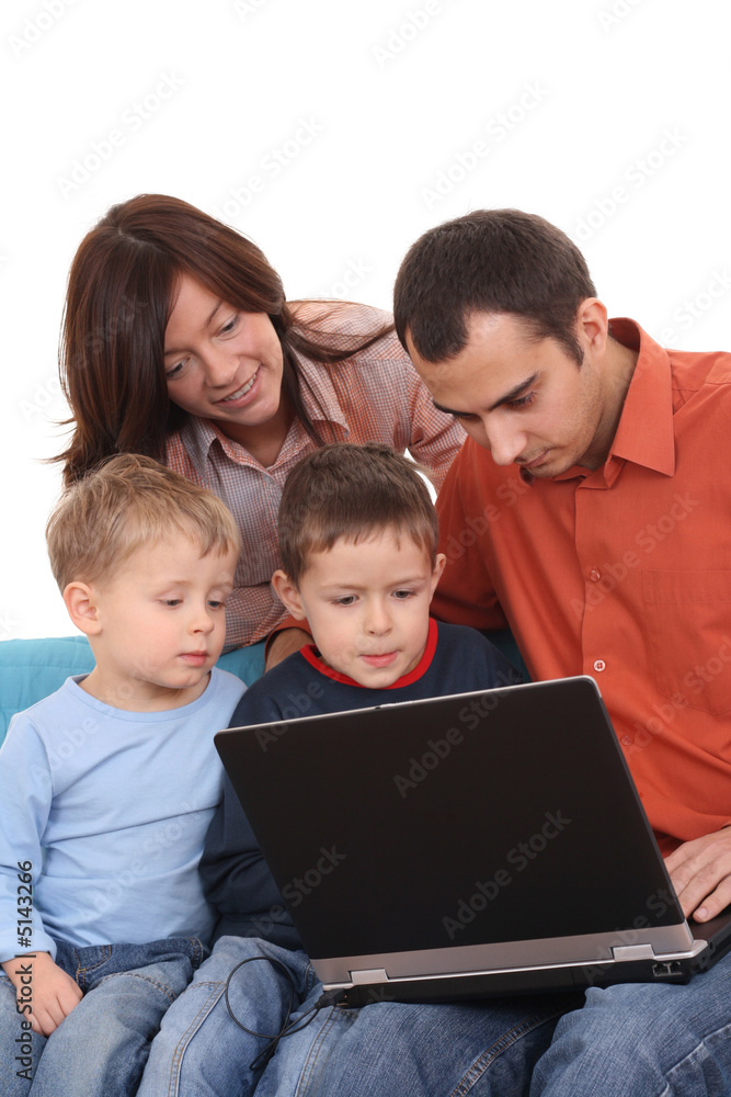 family using laptop