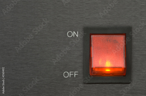 On-off red switch button on chromed background