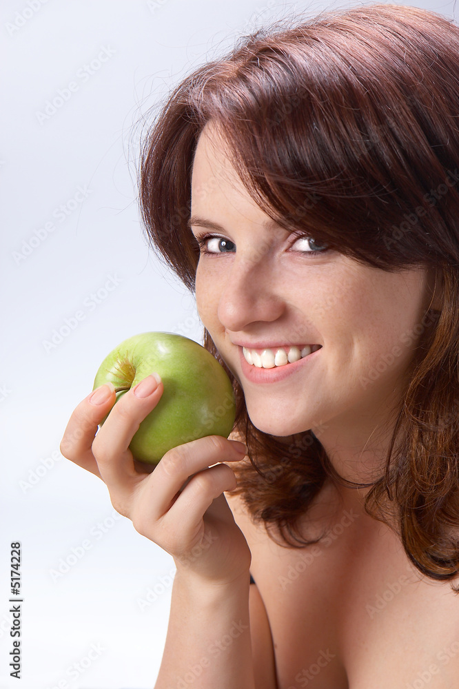 Beautiful girl with a green apple Beautiful girl with a green apple