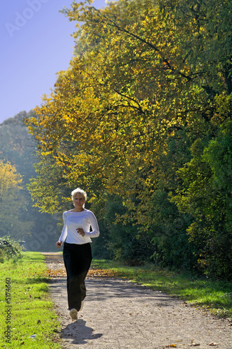 Mature woman running