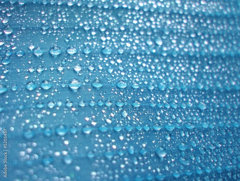 Fototapeta premium Blue water drops on wet surface