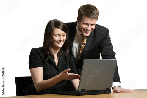 Man and woman with computer