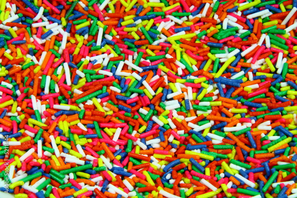 fine multi colored candy sprinkles as background fine multi colored candy sprinkles as background