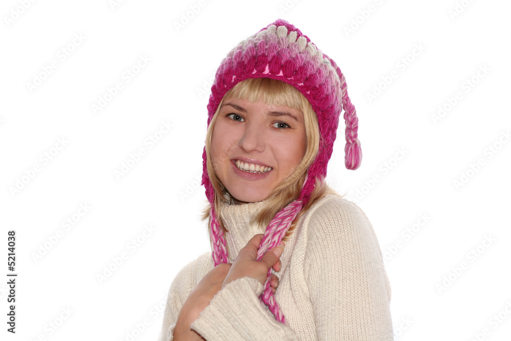 Smiling blond girl in cap