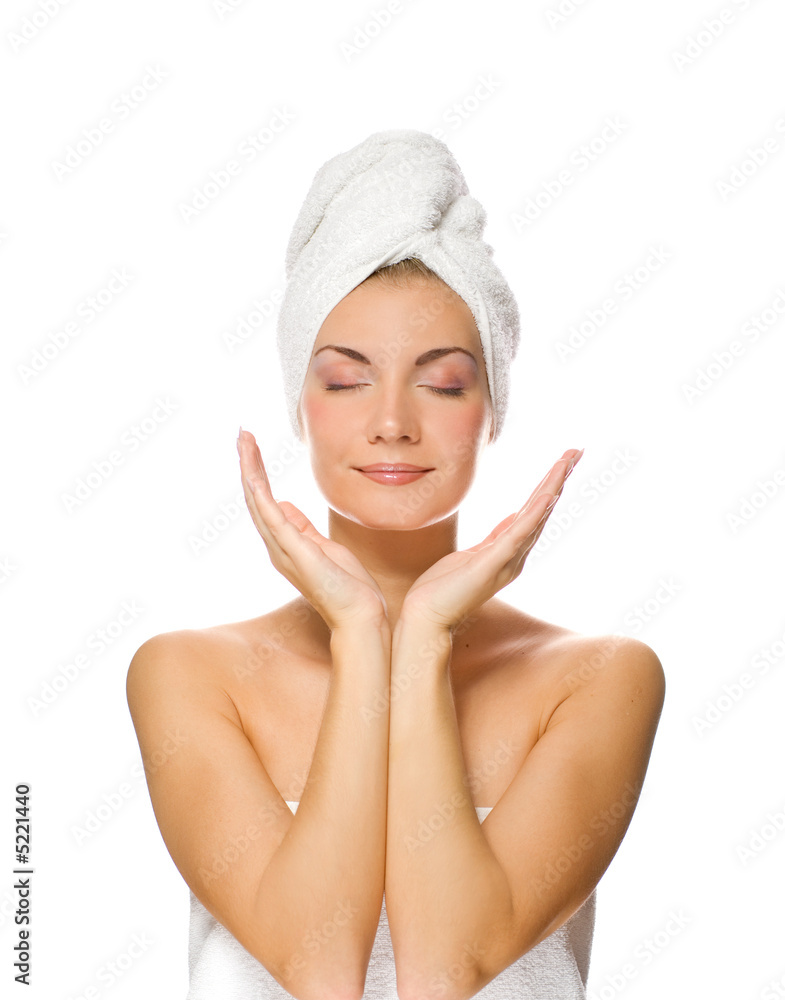 Young lovely lady applying moisturizer to her face after shower Young lovely lady applying moisturizer to her face after shower