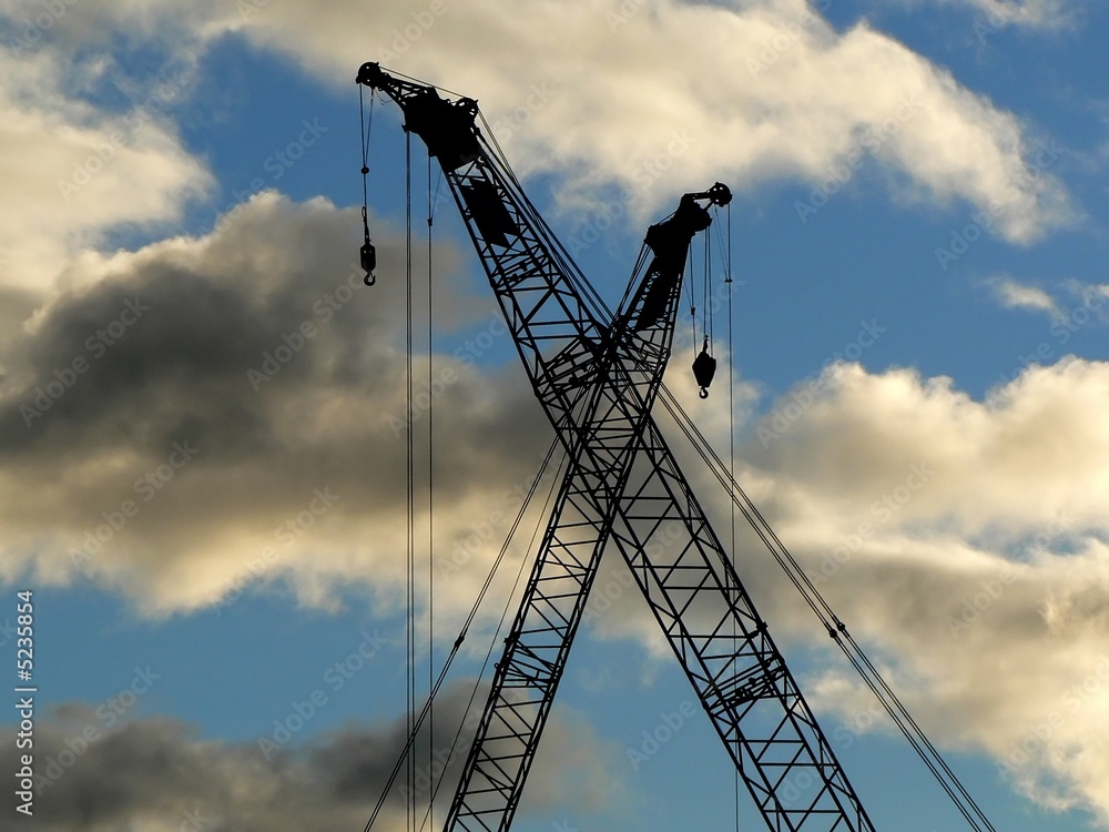 Construction cranes silhouettes