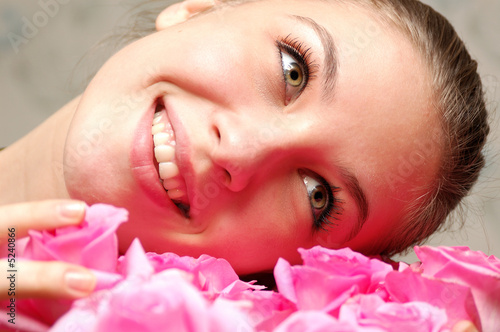 happy girl and bouquet of roses