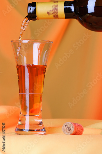 Pour some wine into a glass