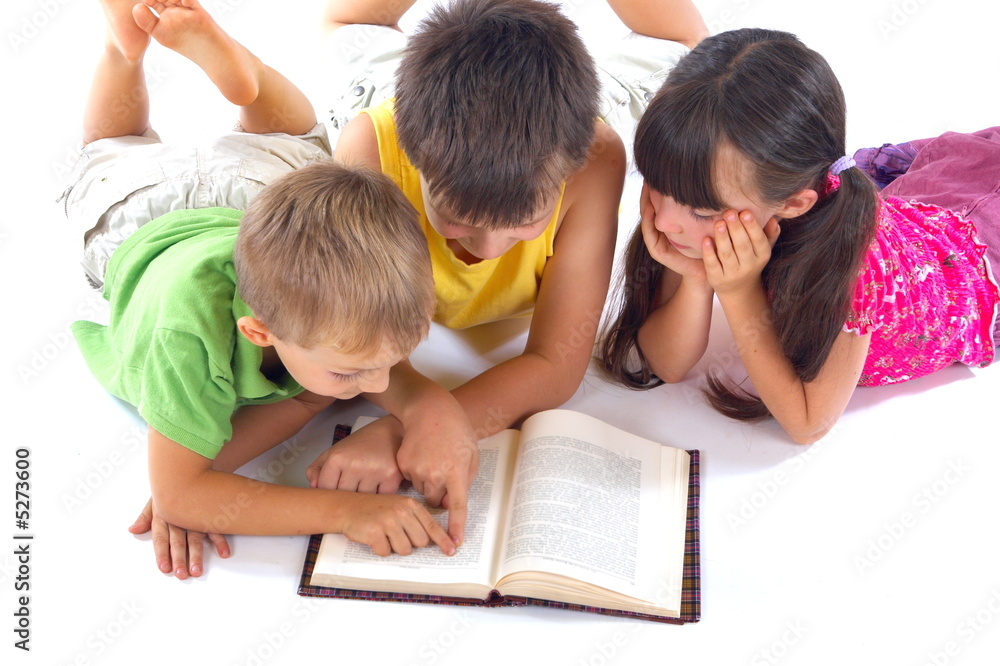 Kids reading a book Kids reading a book