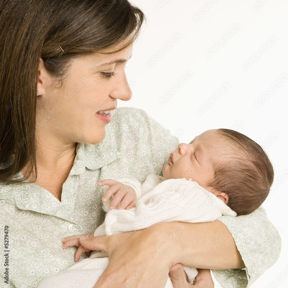Smiling mother holding baby. Smiling mother holding baby.