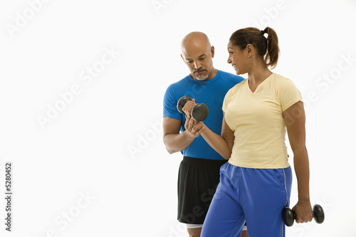 Fotografie Woman and man exercising.