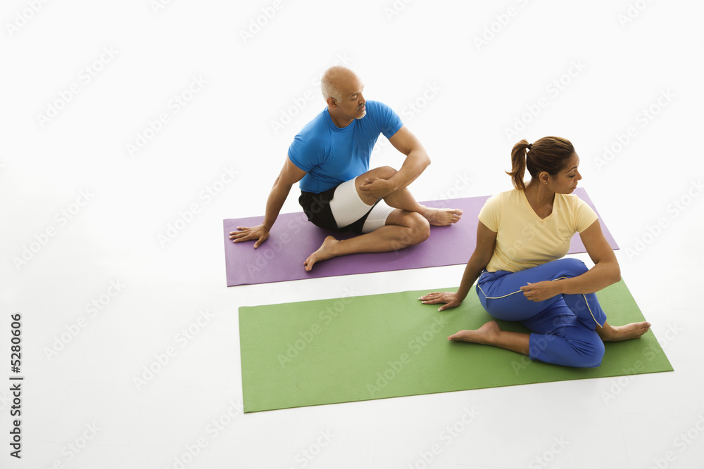 Man and woman stretching. Man and woman stretching.