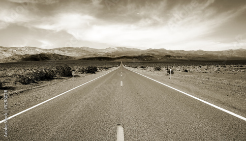 Empty californian highway through the desert photo