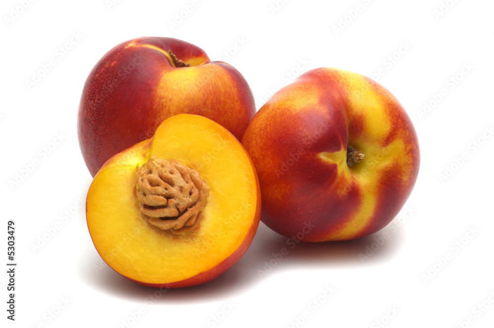 three fresh nectarines on white background three fresh nectarines on white background
