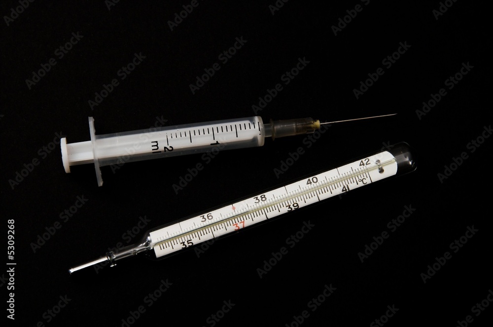 syringe and thermometer syringe and thermometer
