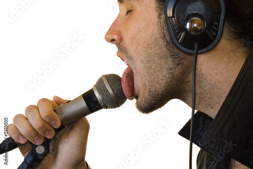 Latino Rock Star Licking Microphone