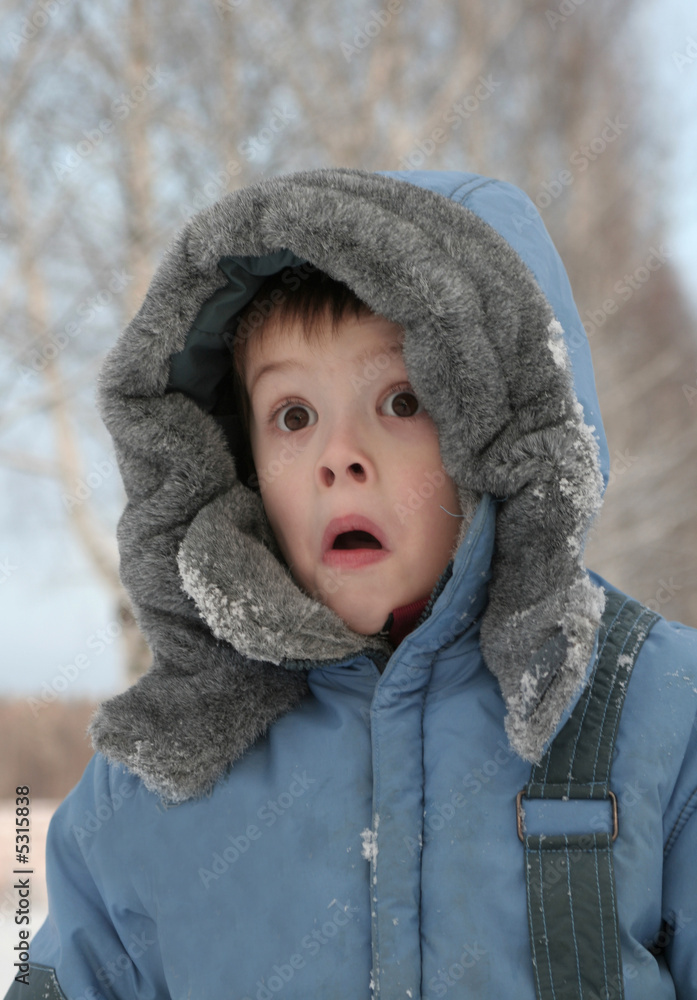 Surprise of the boy in the winter afternoon Surprise of the boy in the winter afternoon