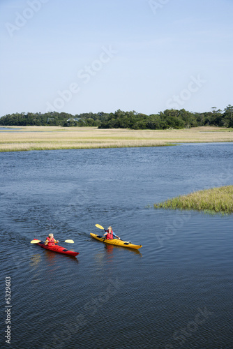Teen boys kayaking.