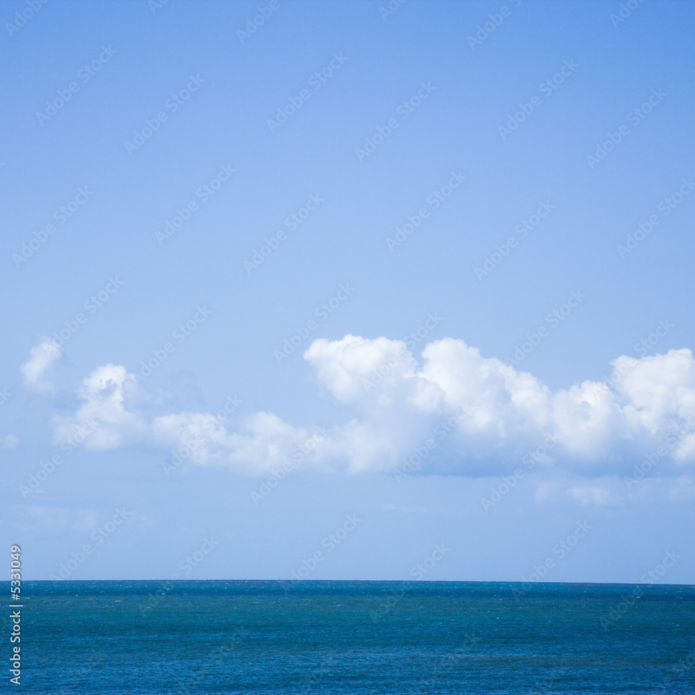 Ocean and sky with low cumulus clouds. Ocean and sky with low cumulus clouds.