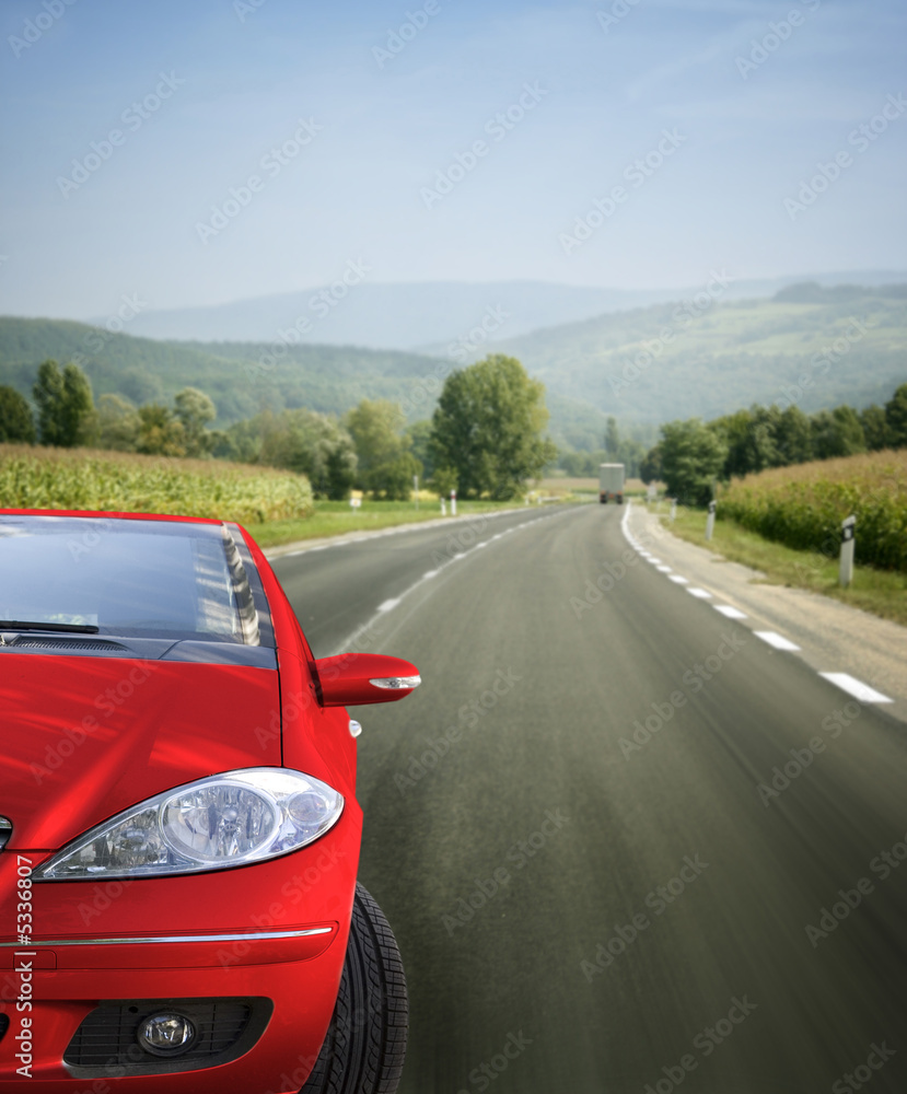 Red car on the road