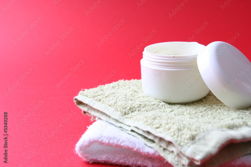 Moisturizing cream isolated on red Moisturizing cream isolated on red
