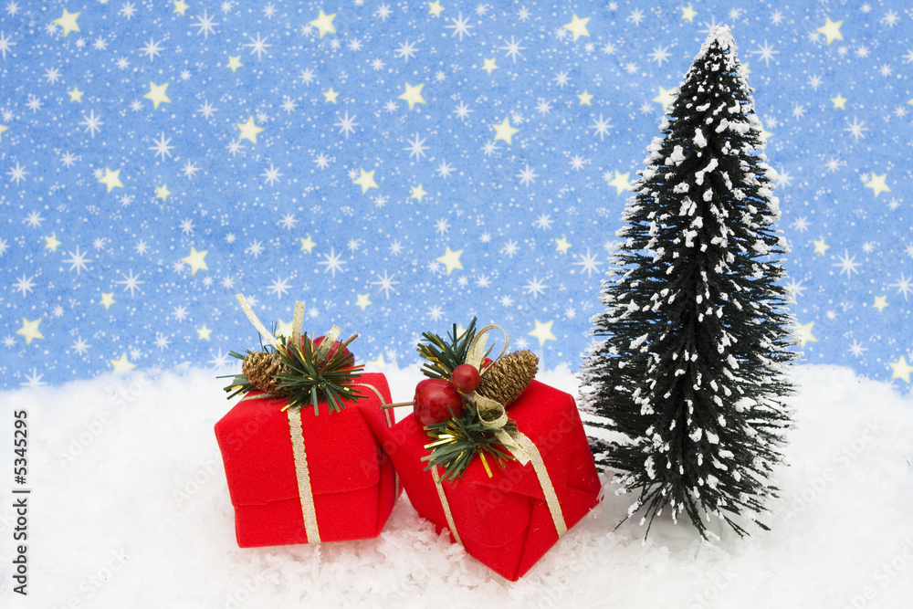 Christmas tree with presents on snow with star background Christmas tree with presents on snow with star background