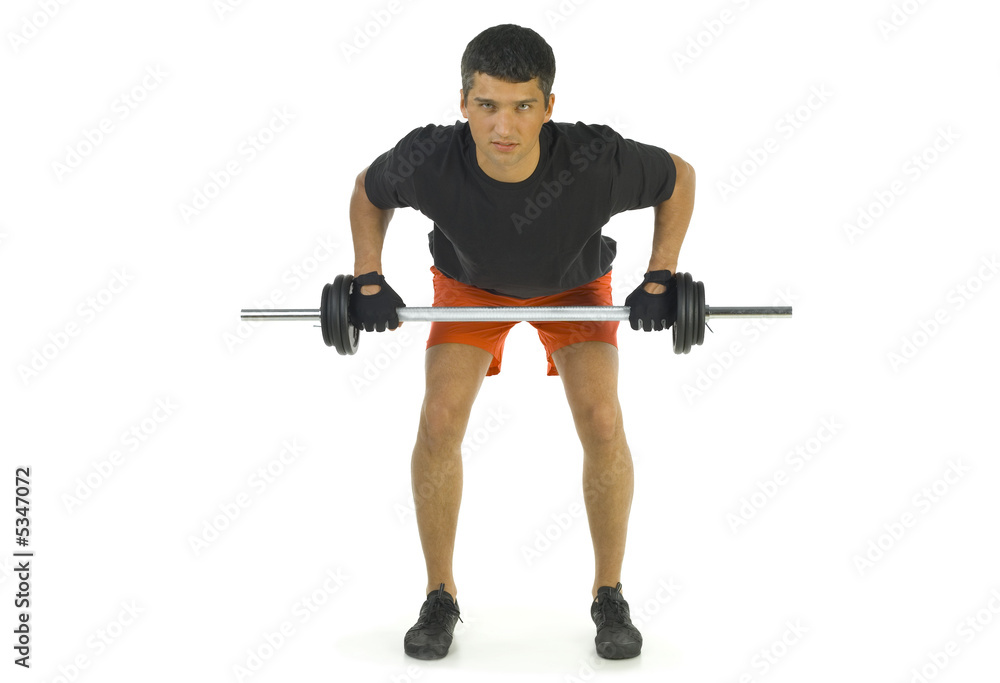 Young man exercising arms muscles with barbell Young man exercising arms muscles with barbell