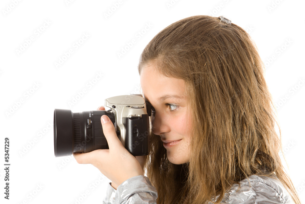 Young girl with SLR camera. Isolate oin white. Young girl with SLR camera. Isolate oin white.