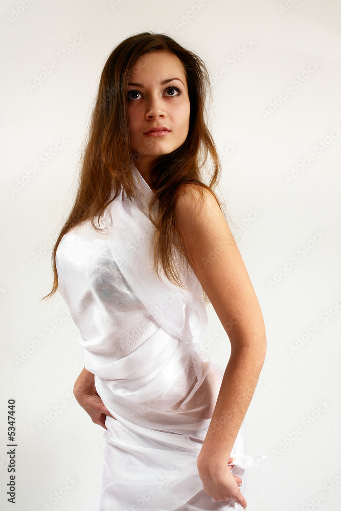 Sexy long-haired girl on the white background. Sexy long-haired girl on the white background.
