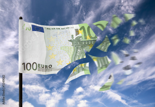 An euro banknote paper money falling into pieces in the wind.