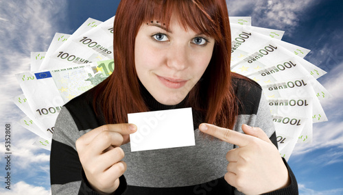 Girl pointing finger at a blank business card