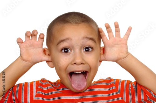 Boy making a funny teasing face