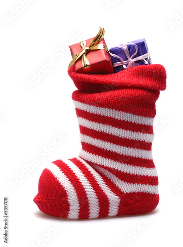 christmas stocking with gifts  isolated on white