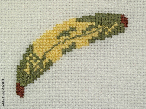 Detail of napkin embroidery (yellow banana), close-up photo