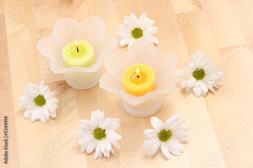 candles and daisy flowers - beauty treatment