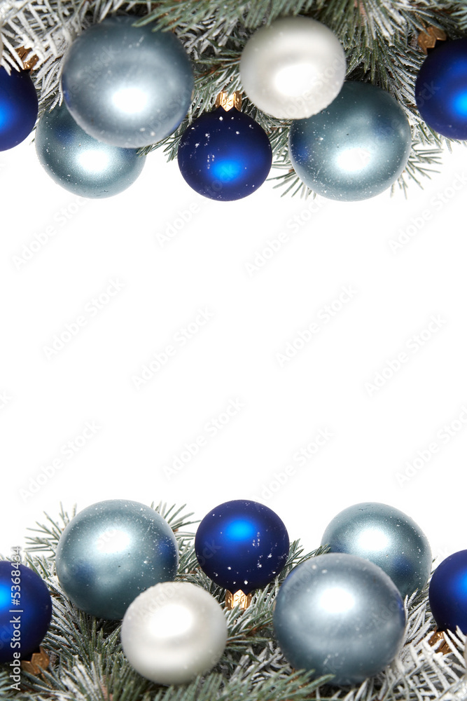 White and blue bulbs covered with snow and spruce thigs White and blue bulbs covered with snow and spruce thigs