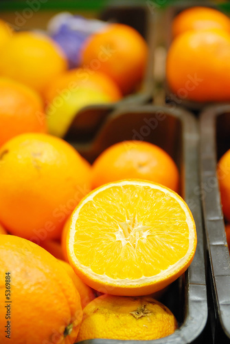 fresh oranges in supermarket photo