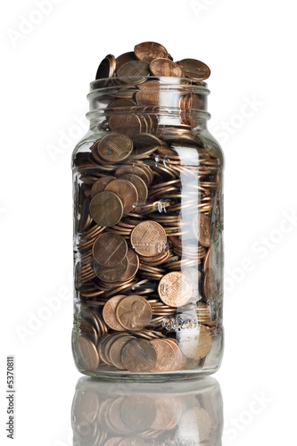 jar full of pennies and dollar bills 