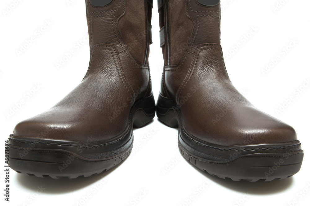 Man's boots on a thick sole on a white background