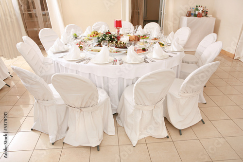 dining table set for a wedding or corporate event © Eduard Stelmakh