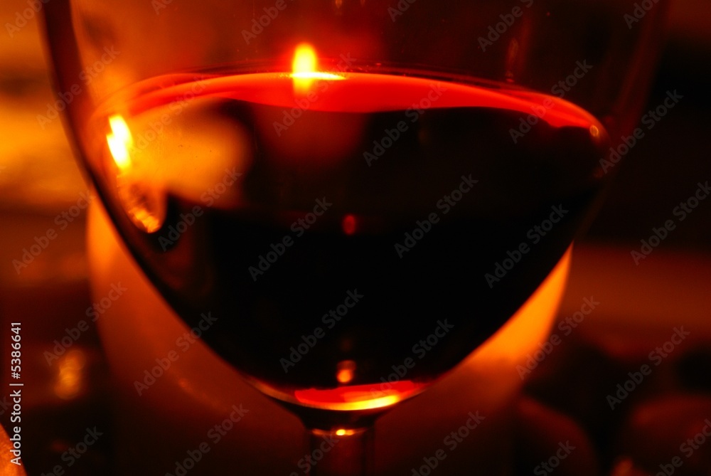 Candlelight and a glass of wine