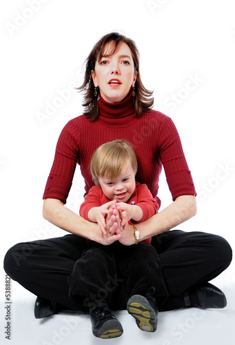 Mother and son with Down Syndrome playing